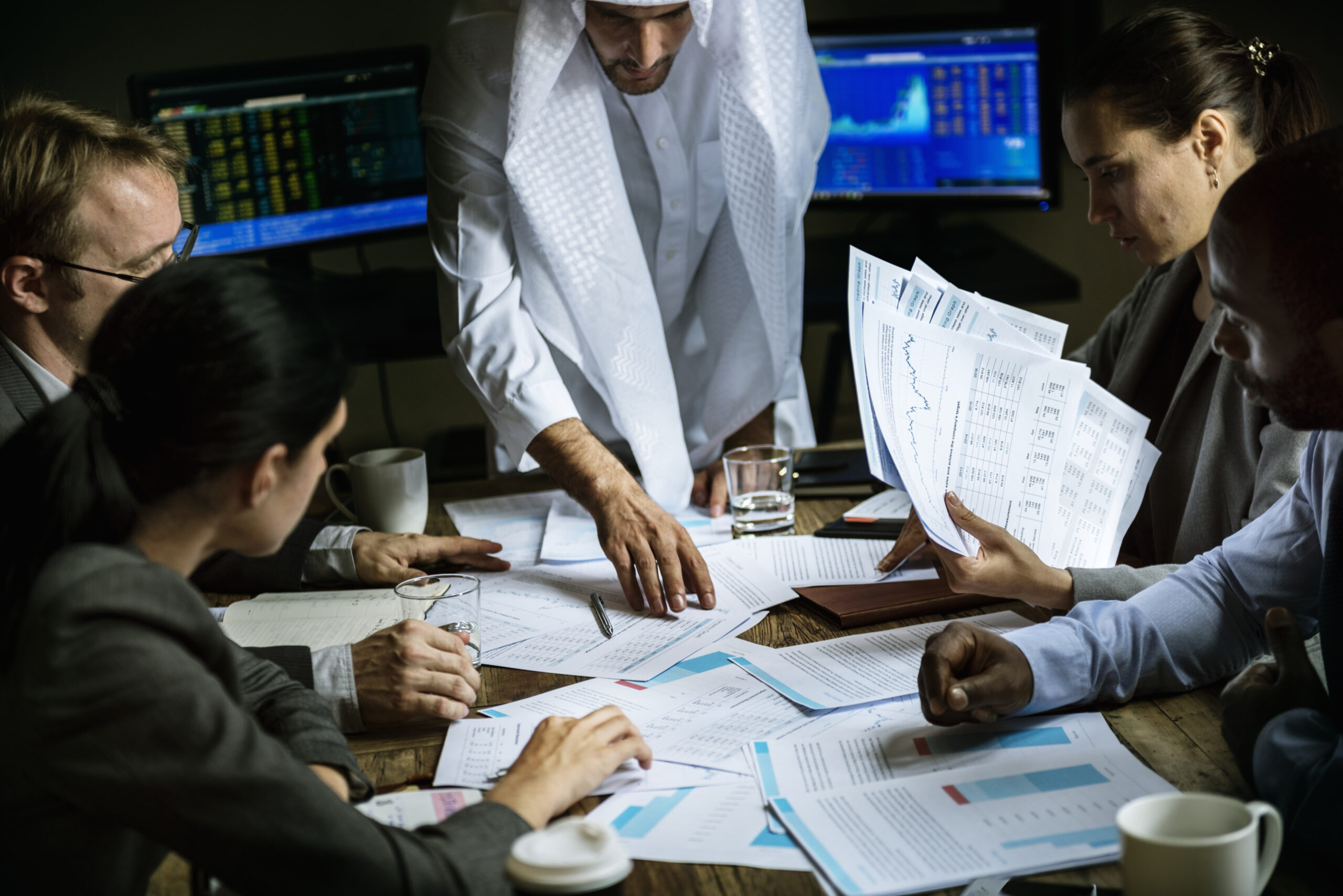 group of business people working together in a meeting room